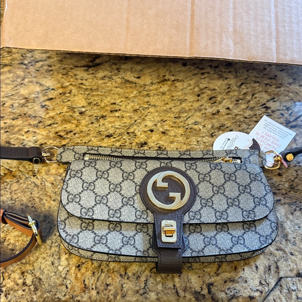 Gucci Black and Cream Clutch with Gold Accents